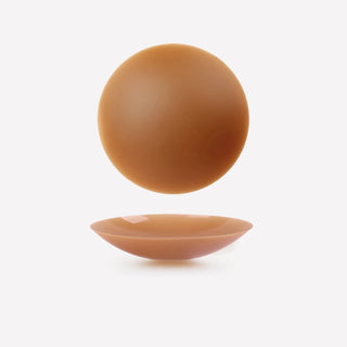 Adhesive nipple covers for seamless look