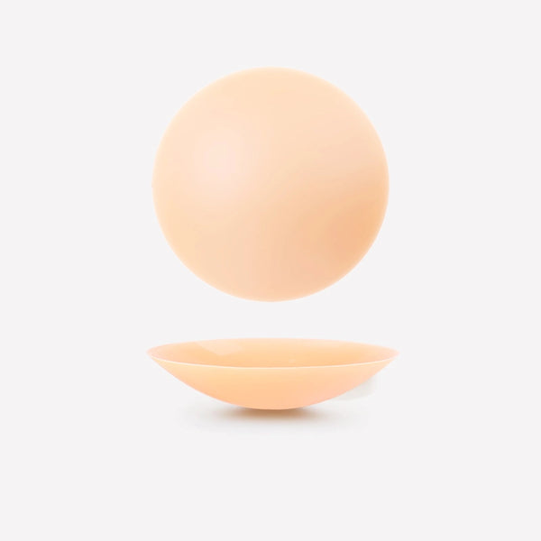 Adhesive nipple covers for seamless look