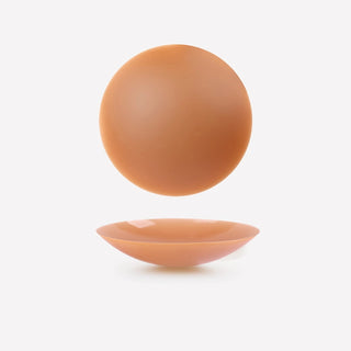 Adhesive nipple covers for seamless look